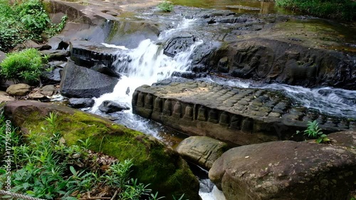 Kbal Spean Waterfall, front shot, Angkorian era archaeological site on the southwest slopes of the Kulen Hills to the northeast of Angkor in Siem Reap, Cambodia photo