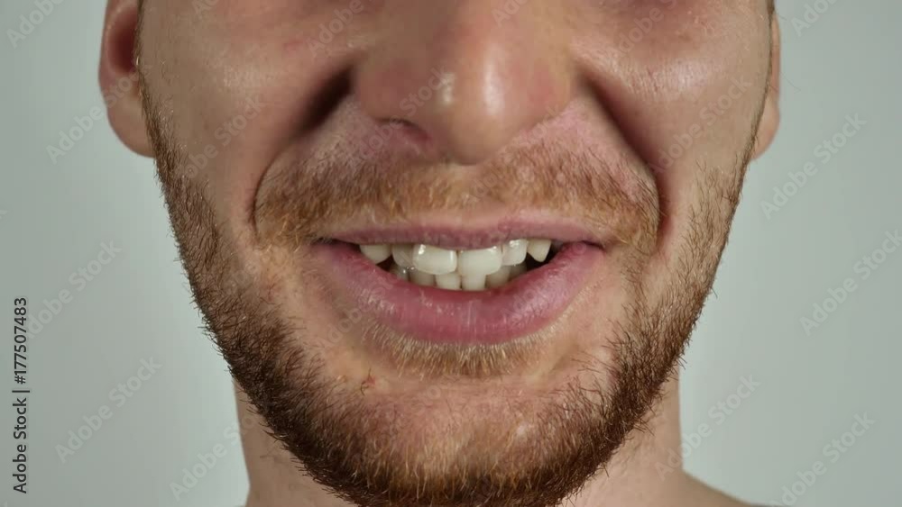 close up face unrecognizable man without eyes smiling. caucasian male with beard laughing close up face unrecognizable man without eyes smiling. caucasian male with beard laughing