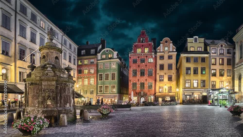 Stortorget square with colorful houses in the center of Old Town of Stockholm, Sweden at dusk (static image with animated sky)
