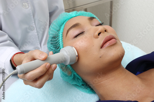 Treatment on Asian Woman as patient to make skin smooth bright