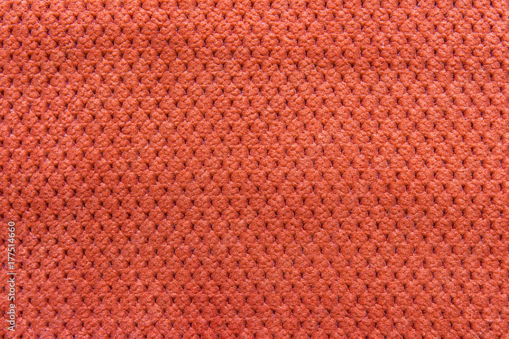 Texture of natural linen fabric in pattern orange color close-up in vintage style Texture of natural linen fabric in pattern orange color close-up in vintage style