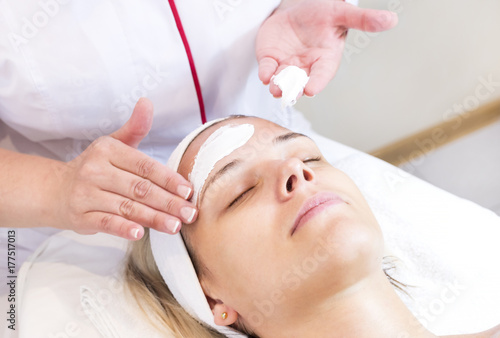 Process cosmetic mask of massage and facials in beauty salon 