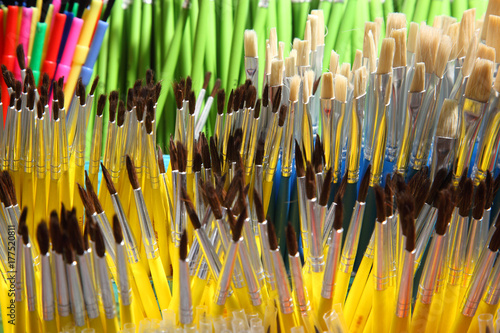 Various paintbrushes collection. School supplies, stationery accessories. Colorful stationery. Stationery store. 