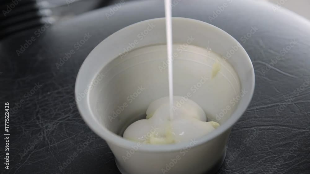 hair dye preparation, colorist stirs with a brush, beauty salon concept hair dye preparation, colorist stirs with a brush, beauty salon concept