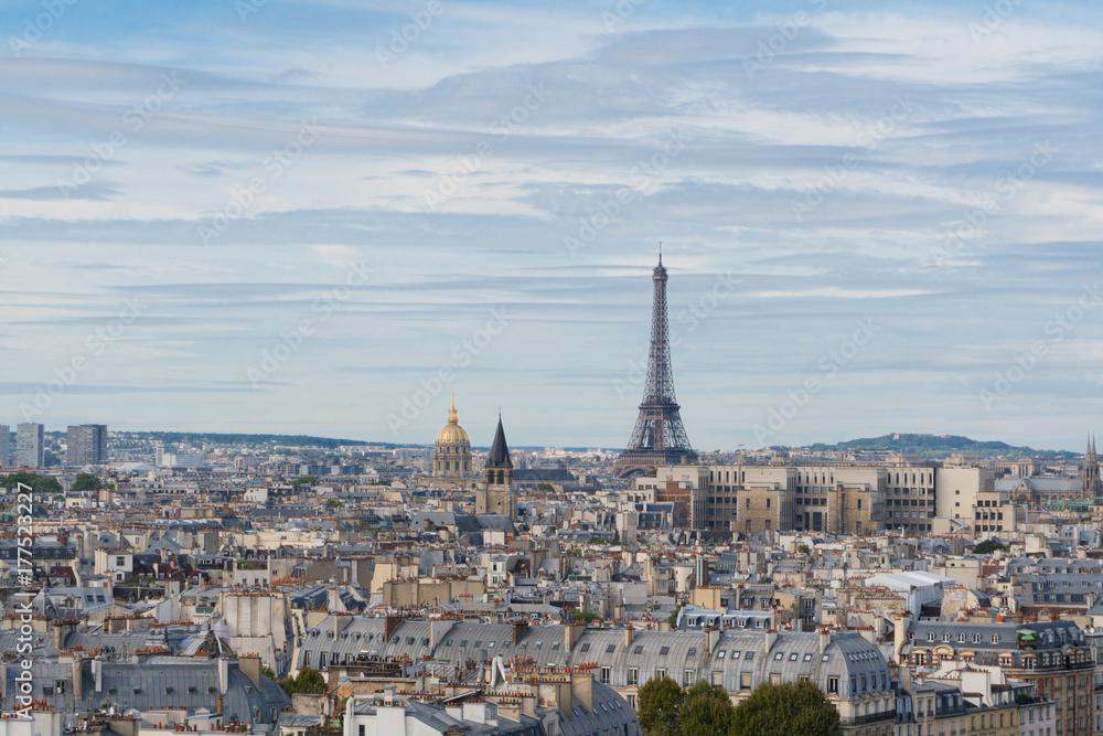 skyline of Paris city with eiffel tower from above in soft morning light, France