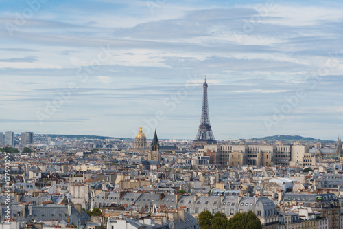 skyline of Paris city with eiffel tower from above in soft morning light, France