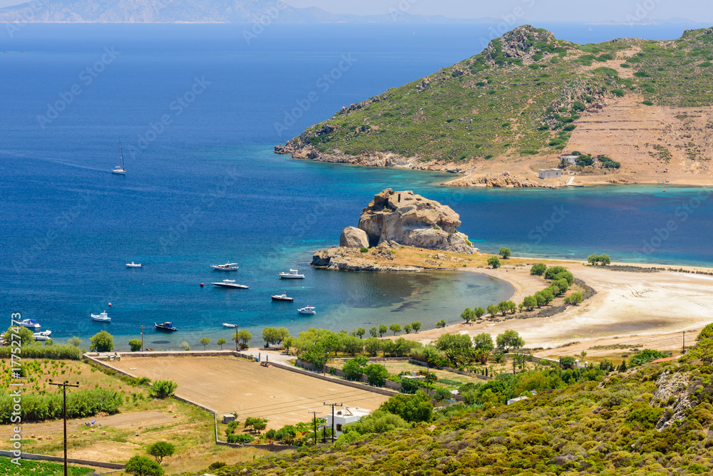 Petra beach is a picturesque beach on the island of Patmos, aerial view in a Sunny summer day, Patmos island, Dodecanese, Greece