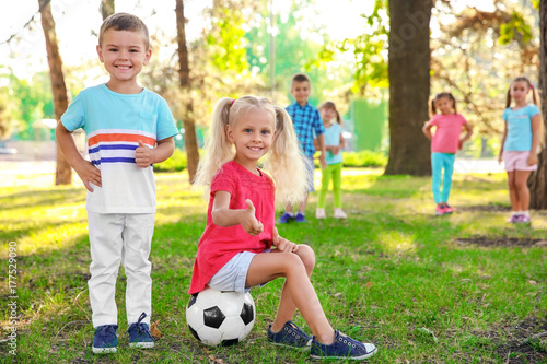 Cute little children with b...
