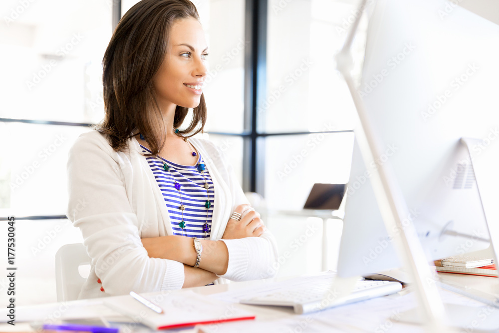 Happy entrepreneur or freelancer in an office or home Happy entrepreneur or freelancer in an office or home