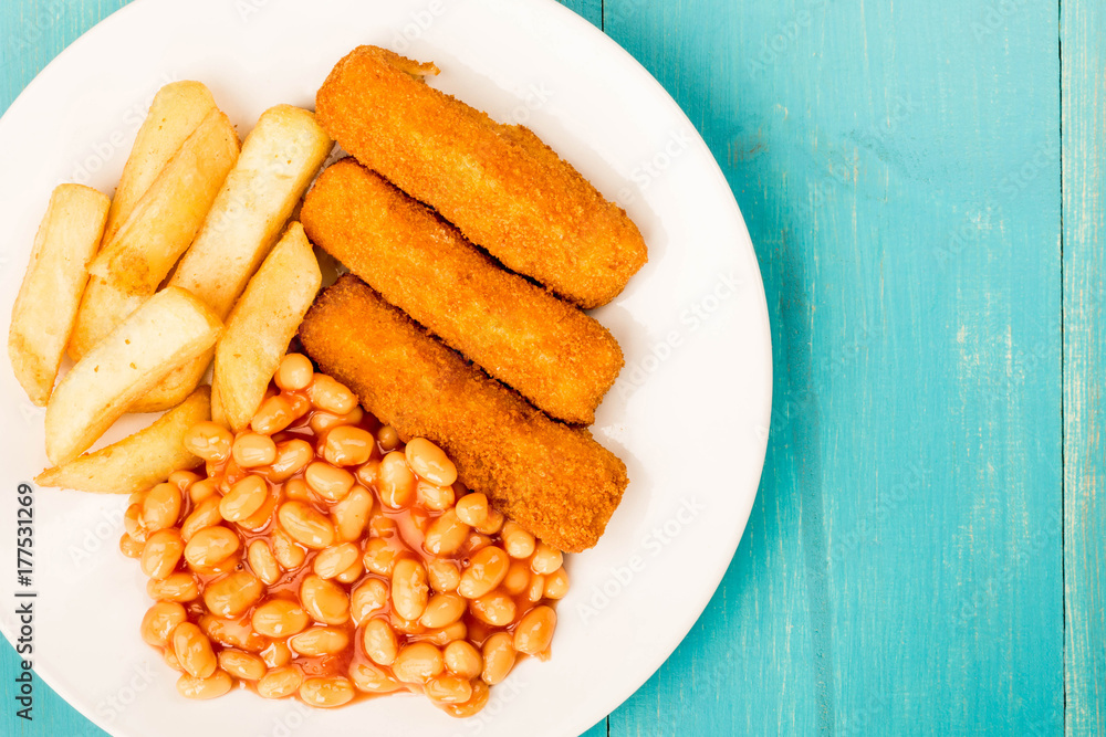 Grilled Cod Fish Fingers With Chunky Chips And Baked Beans in Tomato Sauce  Stock Photo