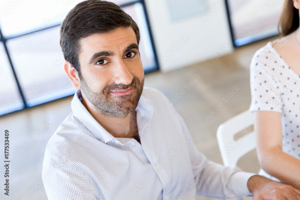 Young man in casual in office