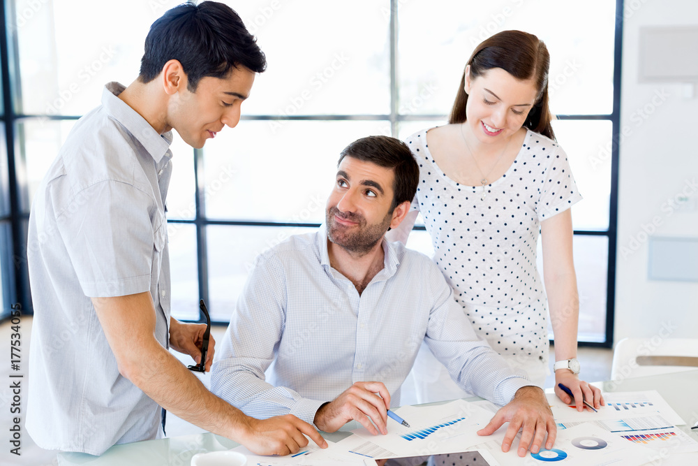 Group of happy young business people in a meeting Group of happy young business people in a meeting