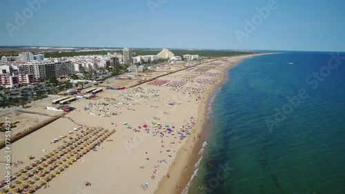 Aerial. Video shooting from the drone, beach town MOnte Gordo. Portugal