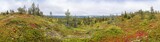 Mountains, forests, lakes panoramic view in autumn. Fall colors - ruska time in Iivaara. Oulanka national park in Finland. Lapland, Nordic countries in Europe