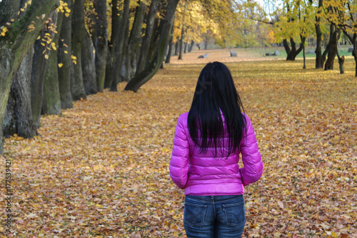 Woman overlooking autumn  landscape