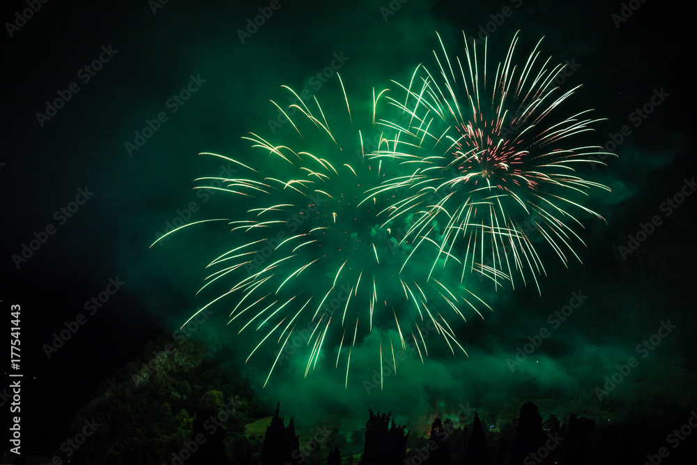 Fototapeta premium Colorful fireworks of traditional Santa Augusta celebration, Vittorio Veneto, Italy