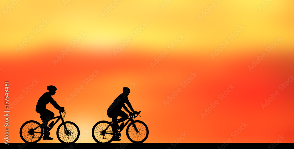 Obraz premium Silhouette man and bike relaxing on sunrise background