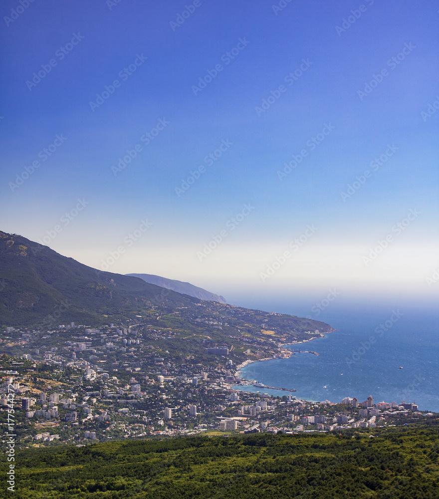 view from the height of the resort town of Yalta and the Black Sea from the mountains of Ai-Petri
