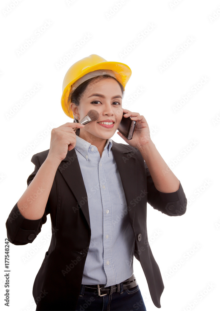 woman engineer hold mobile and make up brush woman engineer hold mobile and make up brush