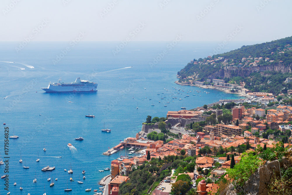 colorful coast and turquiose water with boats and ships, cote dAzur, french riviera