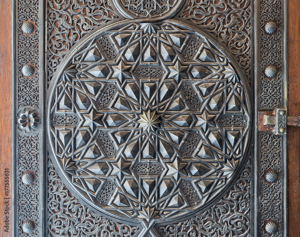 Ornaments of the bronze-plate ornate door of the mosque of The Manial Palace of Prince Mohammed Ali Tewfik, Cairo, Egypt