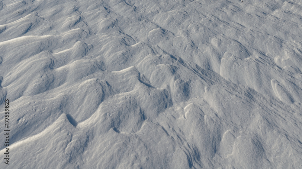 Fototapeta premium The snow froze as waves,strong wind.