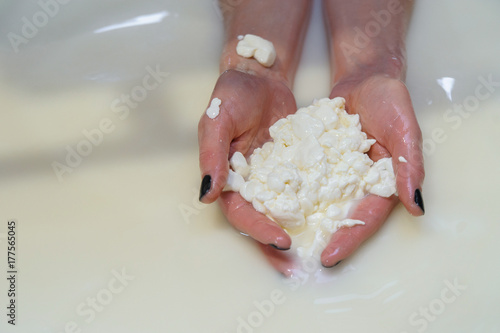 cauldron with the curdled milk brought to high temperature for the production of cheese in the dairy company