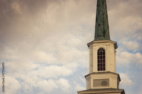 church steeple with clouds