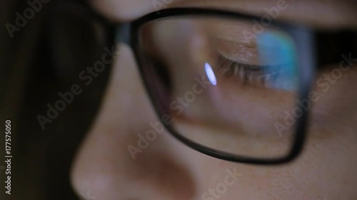 Wallpaper Mural Closeup shot of a female eye surfing the Internet at night. Reflecting a monitor in glasses Torontodigital.ca