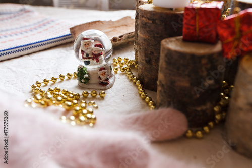 Christmas composition of toys, tree, mittens and postcards photo