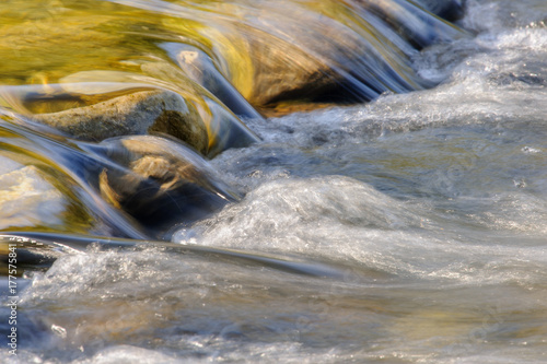 Stones water and warm colors bring positive emotions.