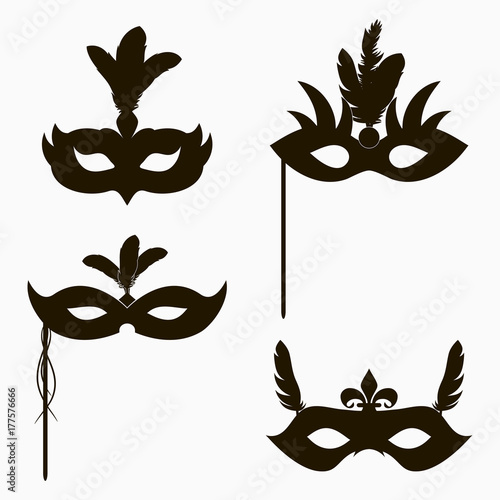 Carnival face masks icons. Set of isolated silhouette decoration for masquerade party with feathers and handle. Vector illustration.