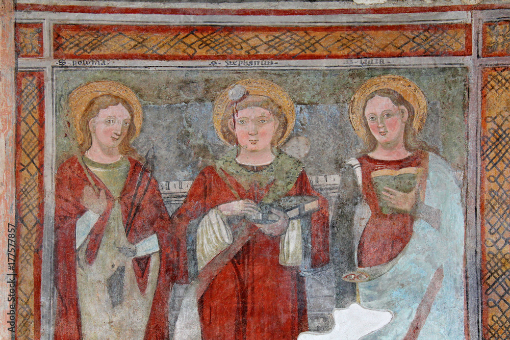 Sant'Apollonia, Santo Stefano e Santa Lucia; affresco nella chiesa di San Vigilio a Pinzolo