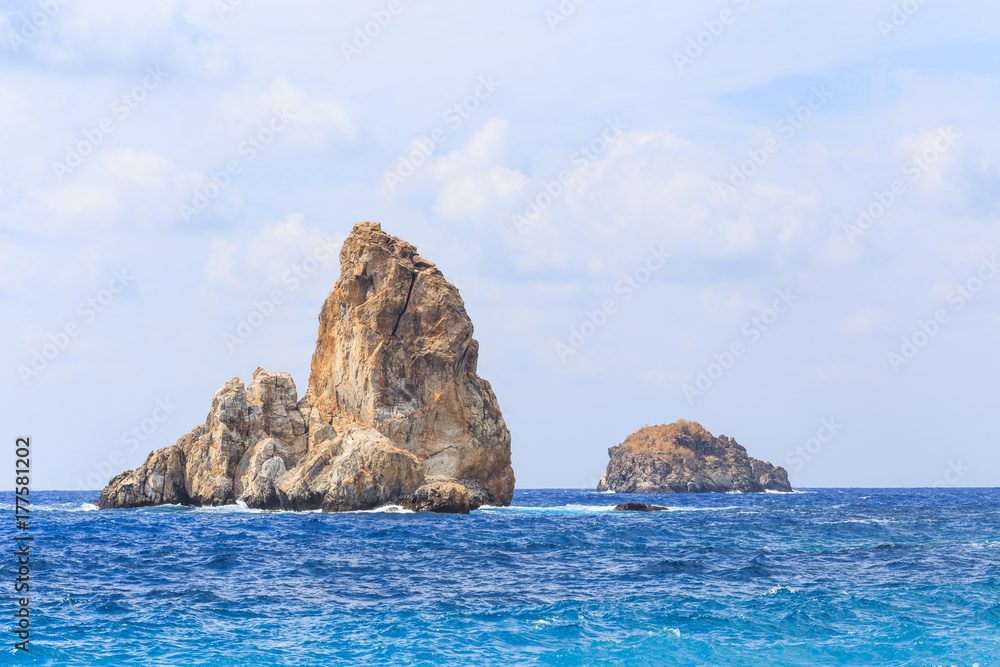 Seascape with rock islands in the water