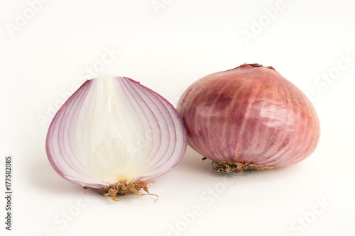 Sliced red onion on white isolated background