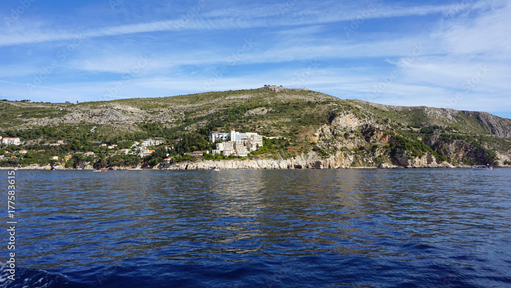 Fototapeta premium wild coast of croatian town dubrovnik from a boat