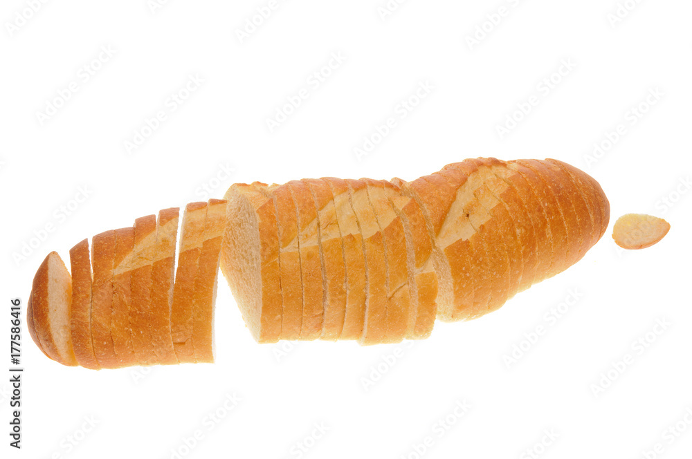 Loaf of sliced French bread isolated on white Loaf of sliced French bread isolated on white