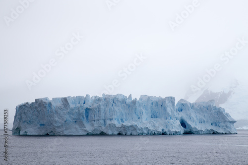 A huge iceberg that has calved of a glacier inside Cierva Cove, Antarctica