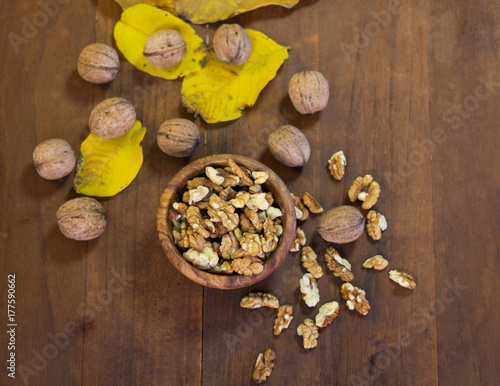 Peeled walnuts in a wooden bowl