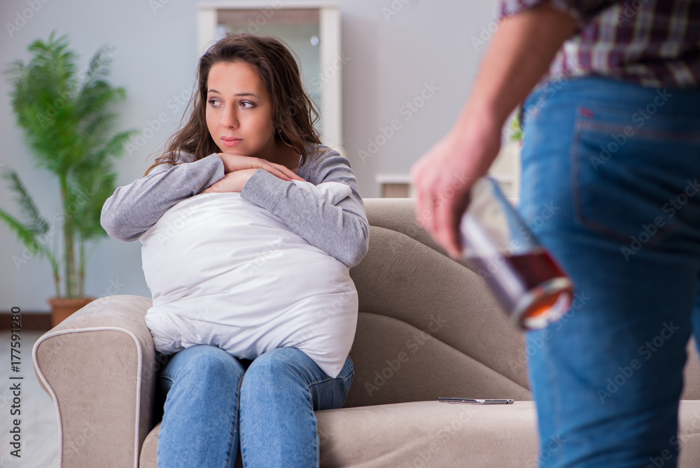 Domestic violence concept in a family argument with drunk alcoho Domestic violence concept in a family argument with drunk alcoho
