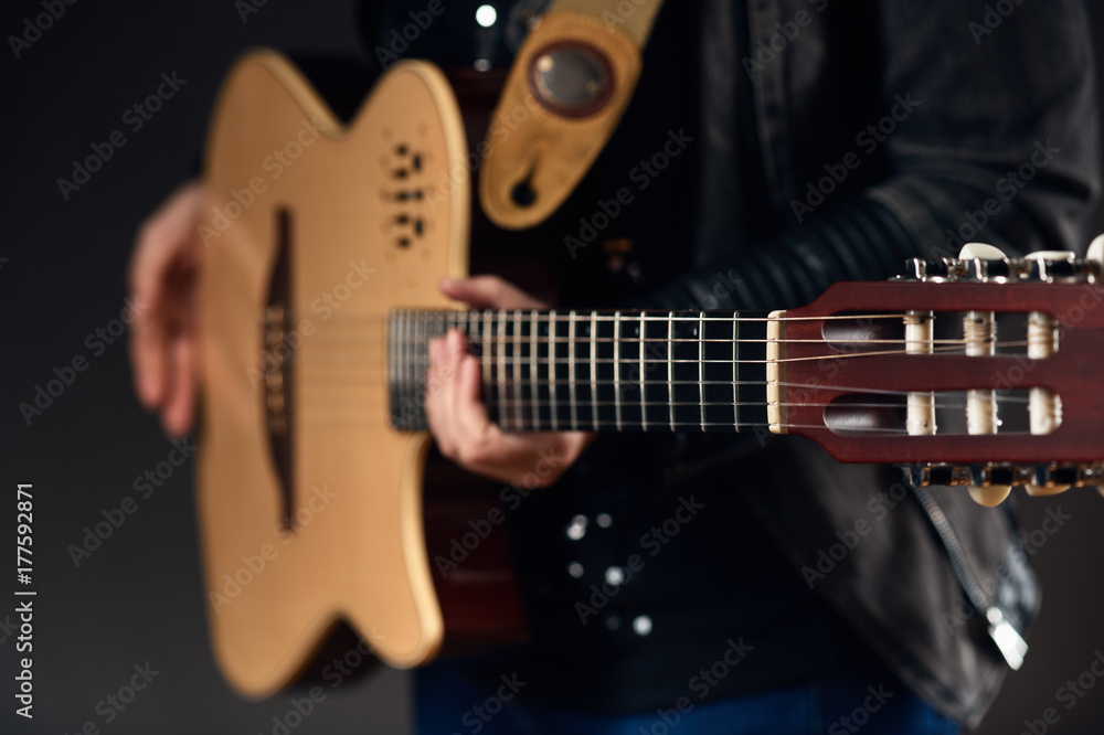 Musician holding the guitar