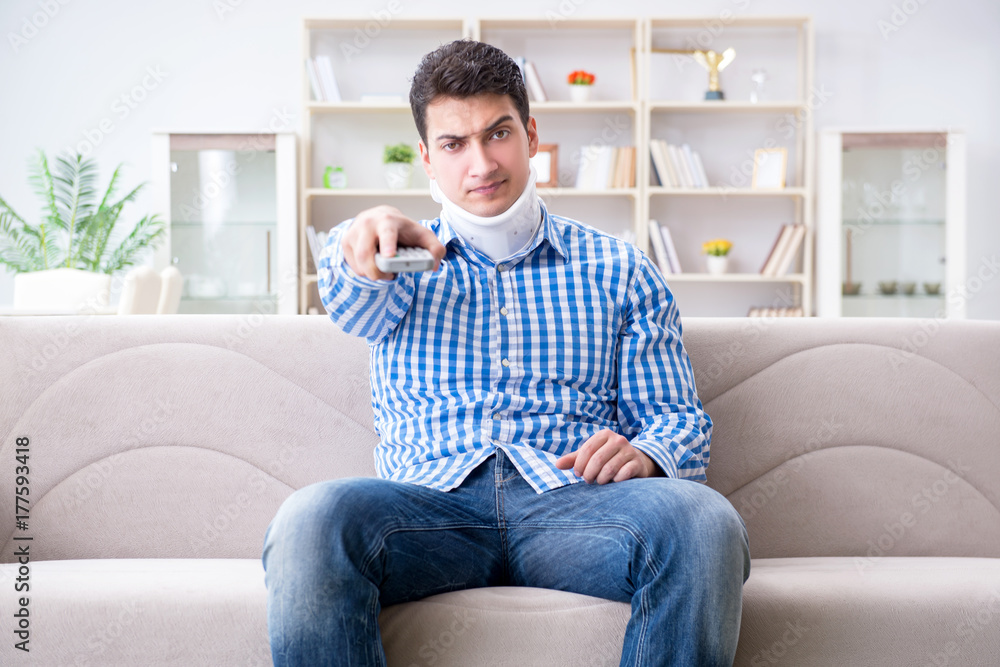 Man with a head neck spine trauma wearing a neck brace cervical Man with a head neck spine trauma wearing a neck brace cervical