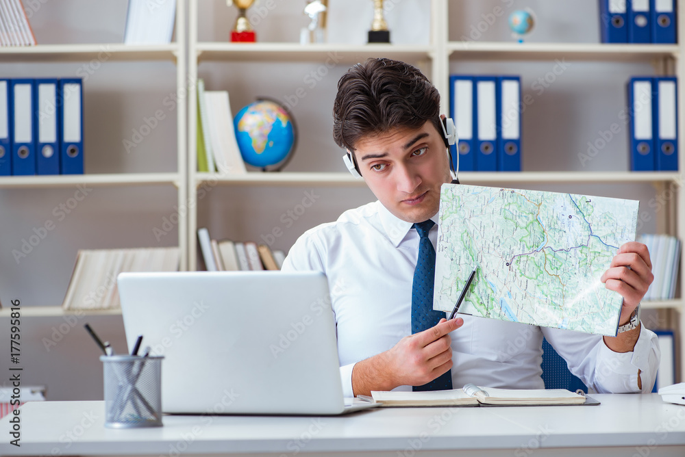 Businessman operator traveling agent working in the office Businessman operator traveling agent working in the office