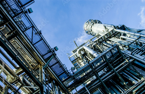 Industrial view at oil refinery plant form industry zone with cloudy sky	