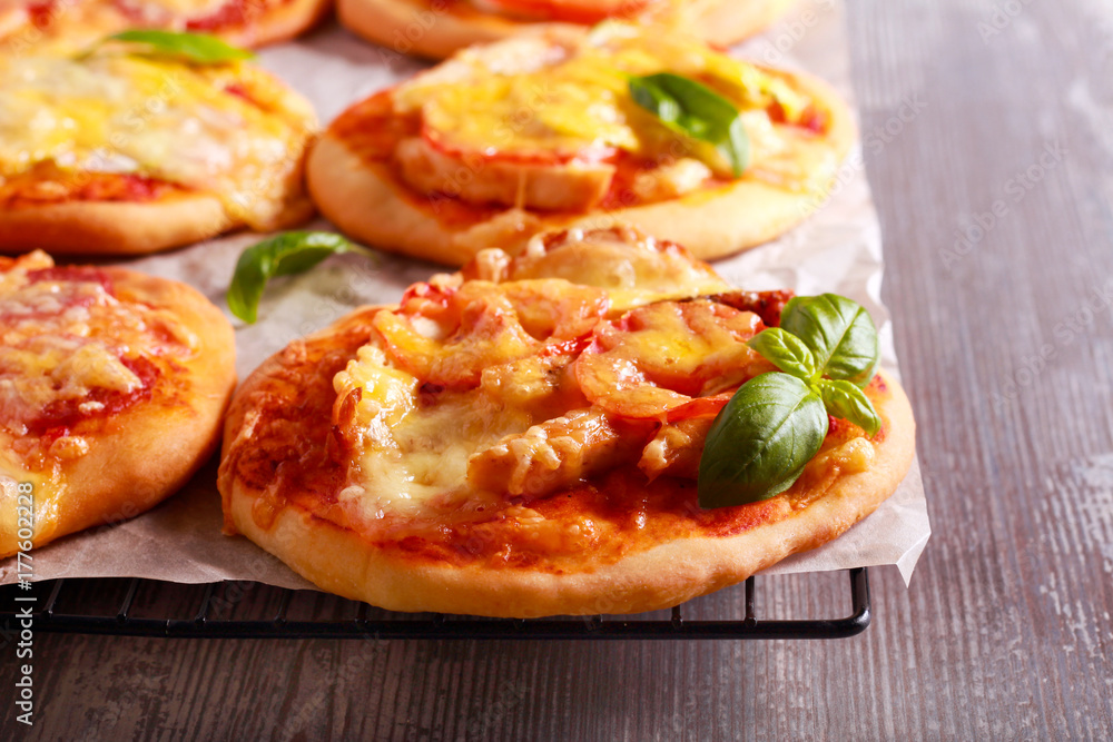 Homemade mini pizzas with different stuffing Homemade mini pizzas with different stuffing