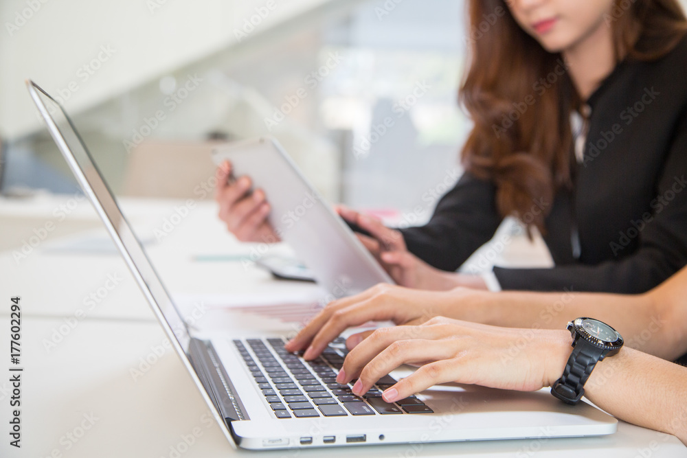 Two woman business working together Two woman business working together