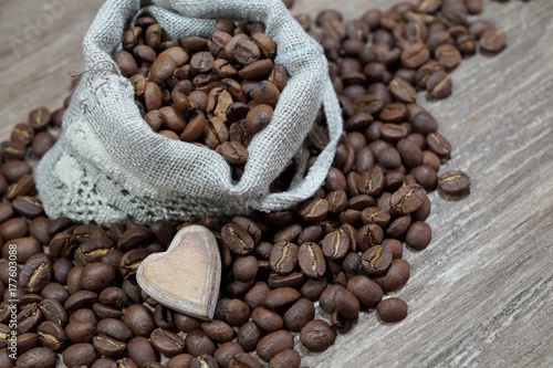 Coffee beans - coffee beans in a linen bag - selective focus © skorpionik00