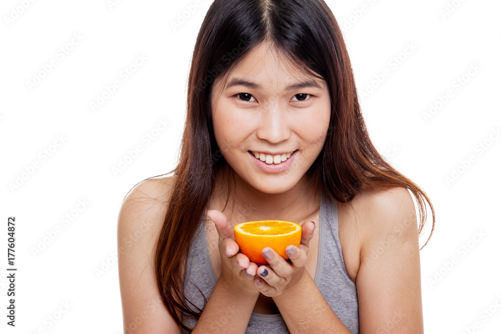 Beautiful Asian healthy girl with orange fruit. Beautiful Asian healthy girl with orange fruit.