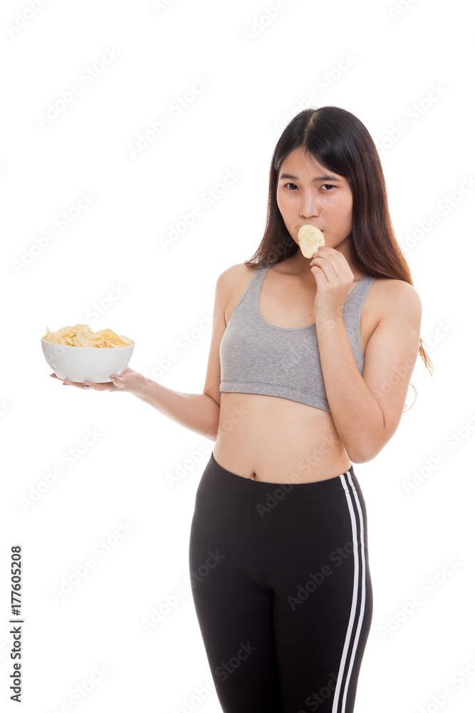 Beautiful Asian healthy girl eat potato chips. Beautiful Asian healthy girl eat potato chips.