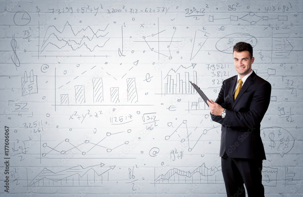 Salesman standing with drawn graph charts Salesman standing with drawn graph charts